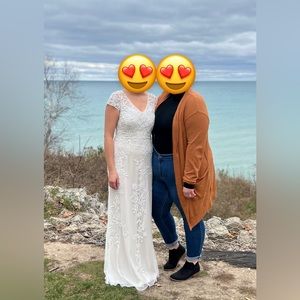 Size 6 sheath wedding gown with floral beaded details